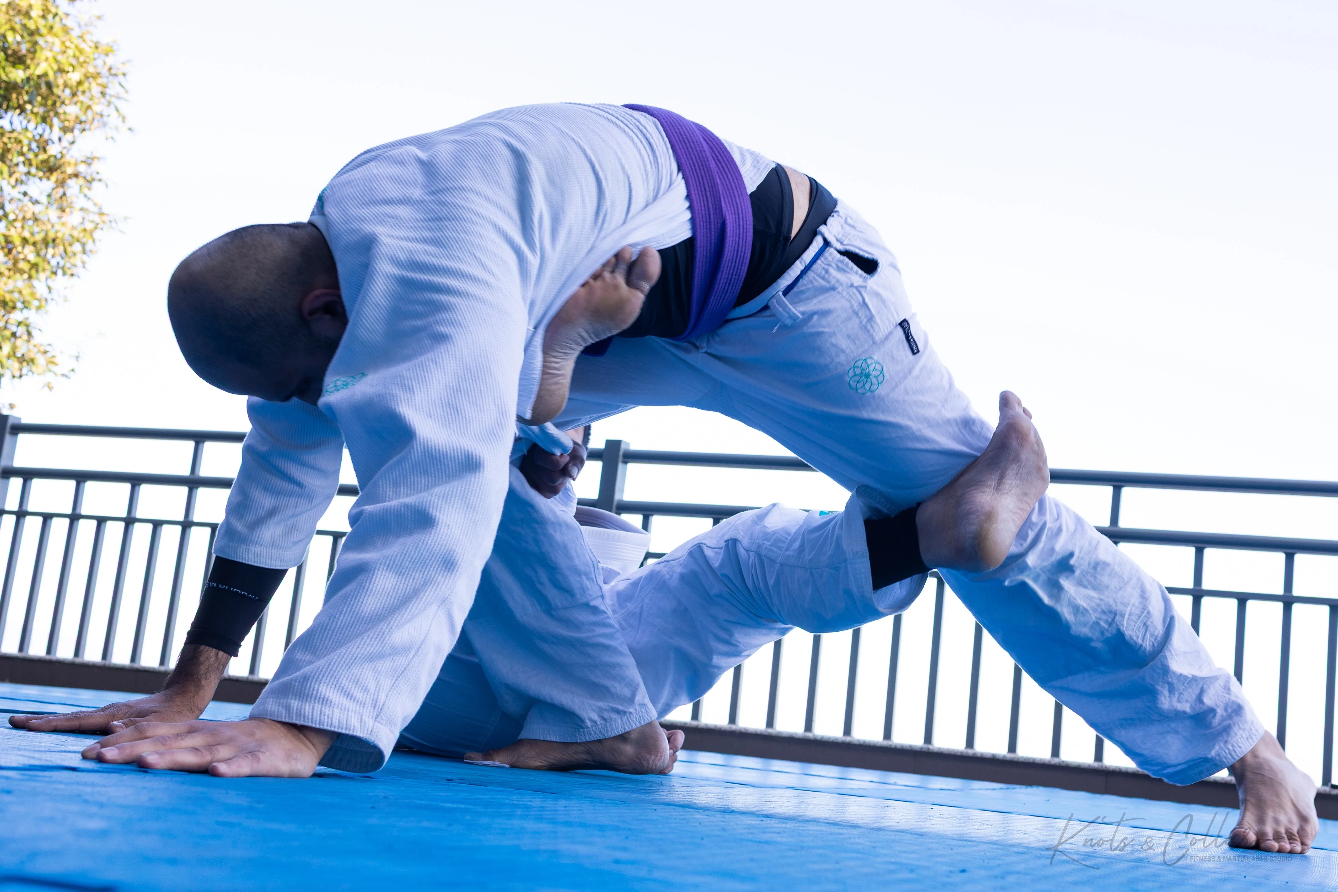 BJJ guard pass drill during outdoor training at KC Manthan retreat