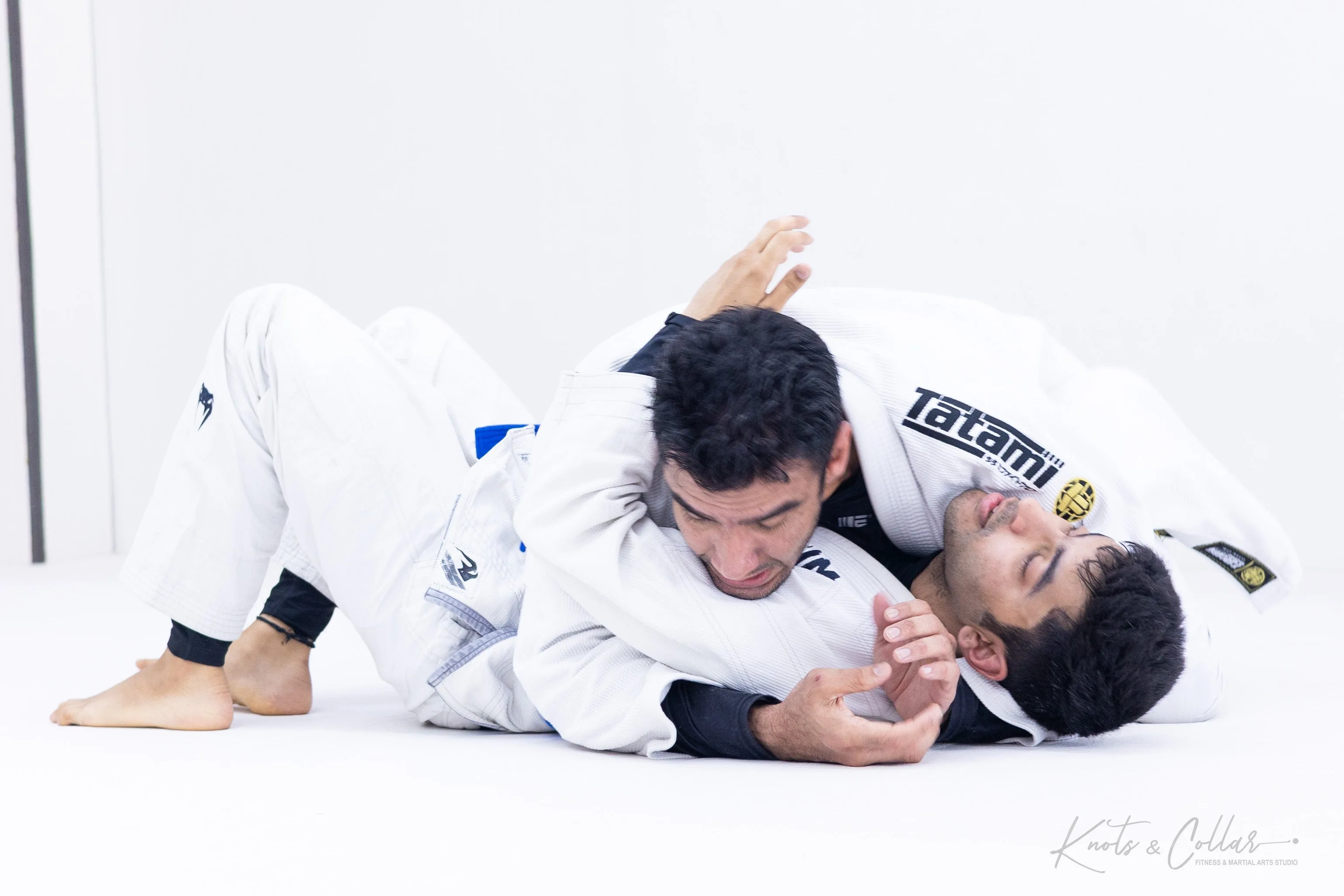 Gi BJJ side control position at Knots and Collar martial arts studio New Delhi