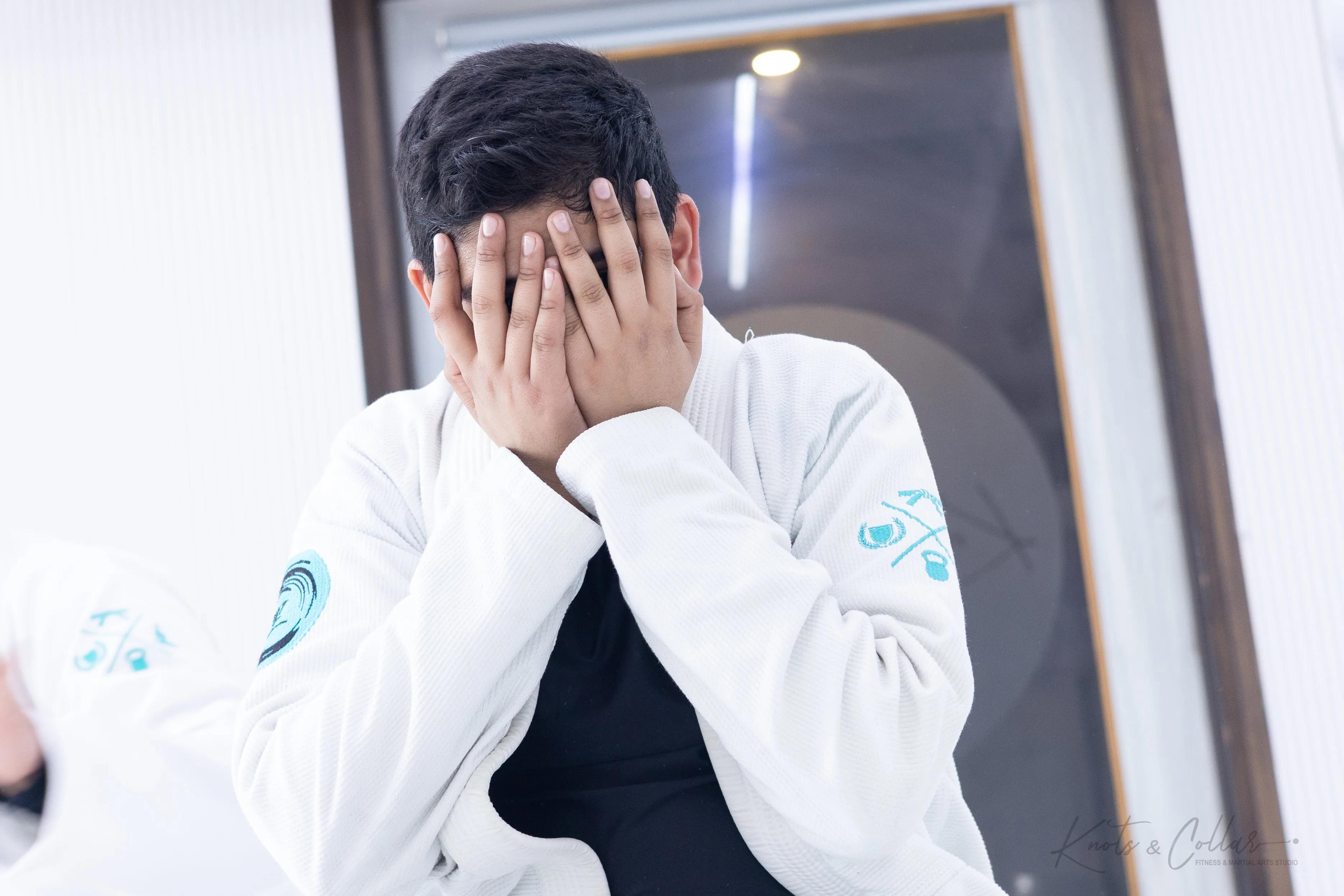A BJJ student's emotional moment on the mat, part of the vulnerability the sport encourages