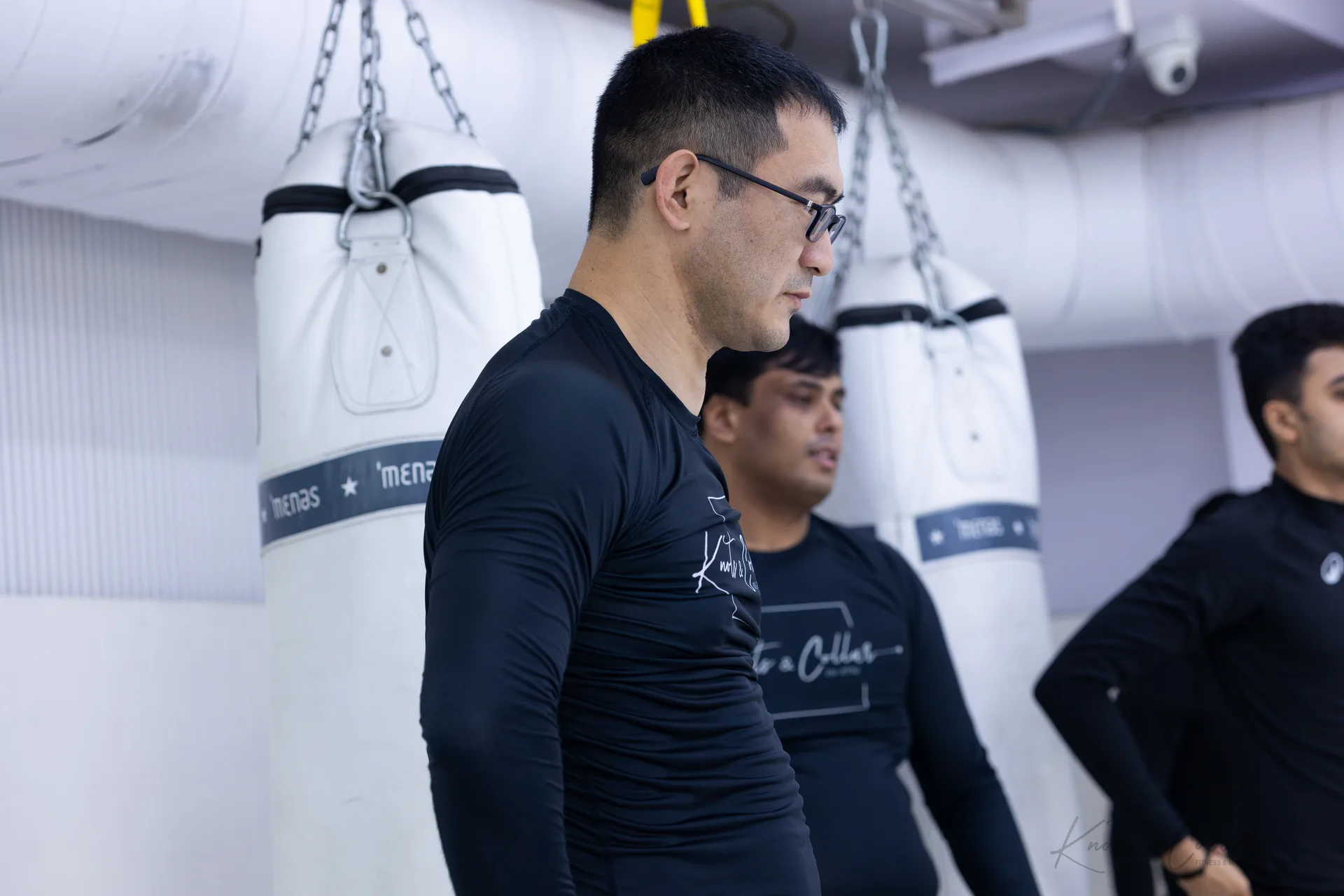 Two students training Gi Brazilian Jiu-Jitsu from guard at Knots & Collar, Defence Colony, New Delhi