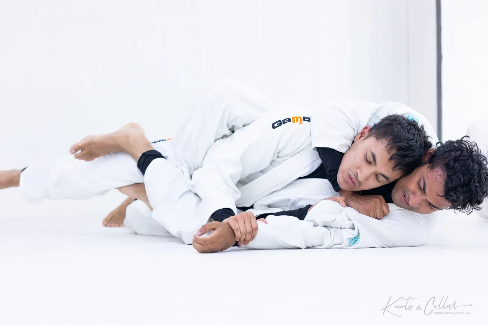 Working a submission in the gi at Knots & Collar, Defence Colony, New Delhi, India