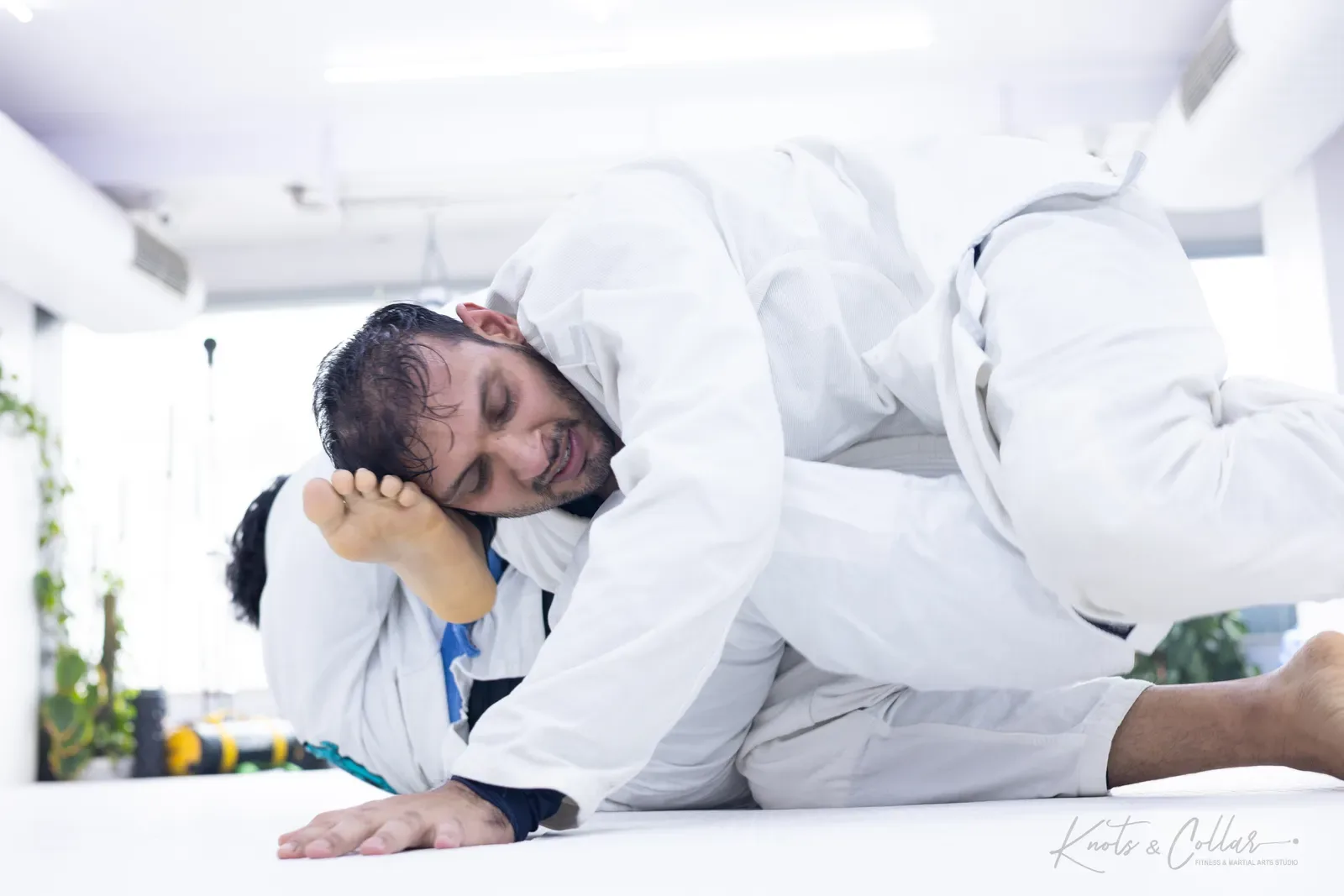 A gi Brazilian Jiu-Jitsu submission at Knots & Collar, Defence Colony, New Delhi, India