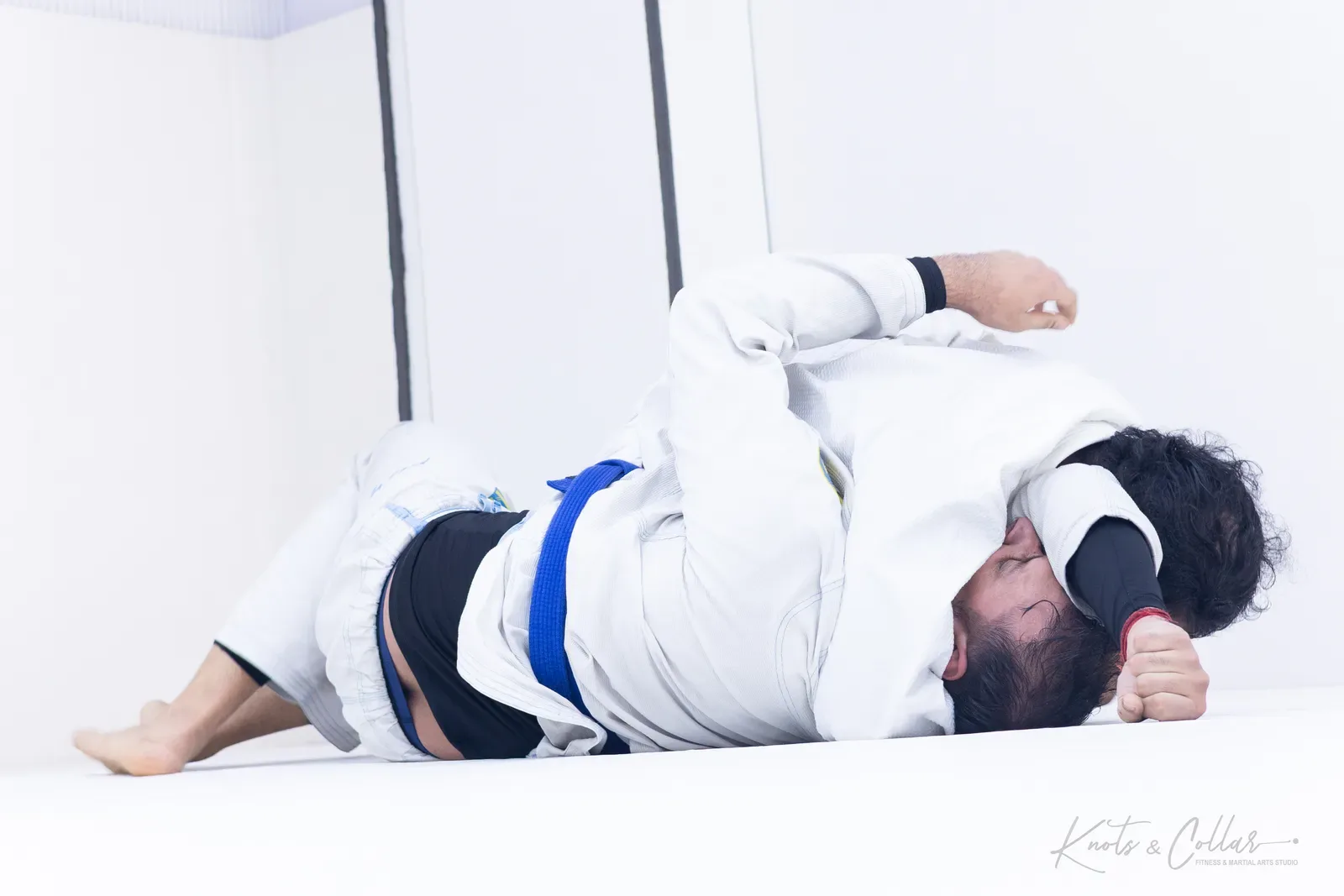 Working a submission in the gi at Knots & Collar, Defence Colony, New Delhi, India