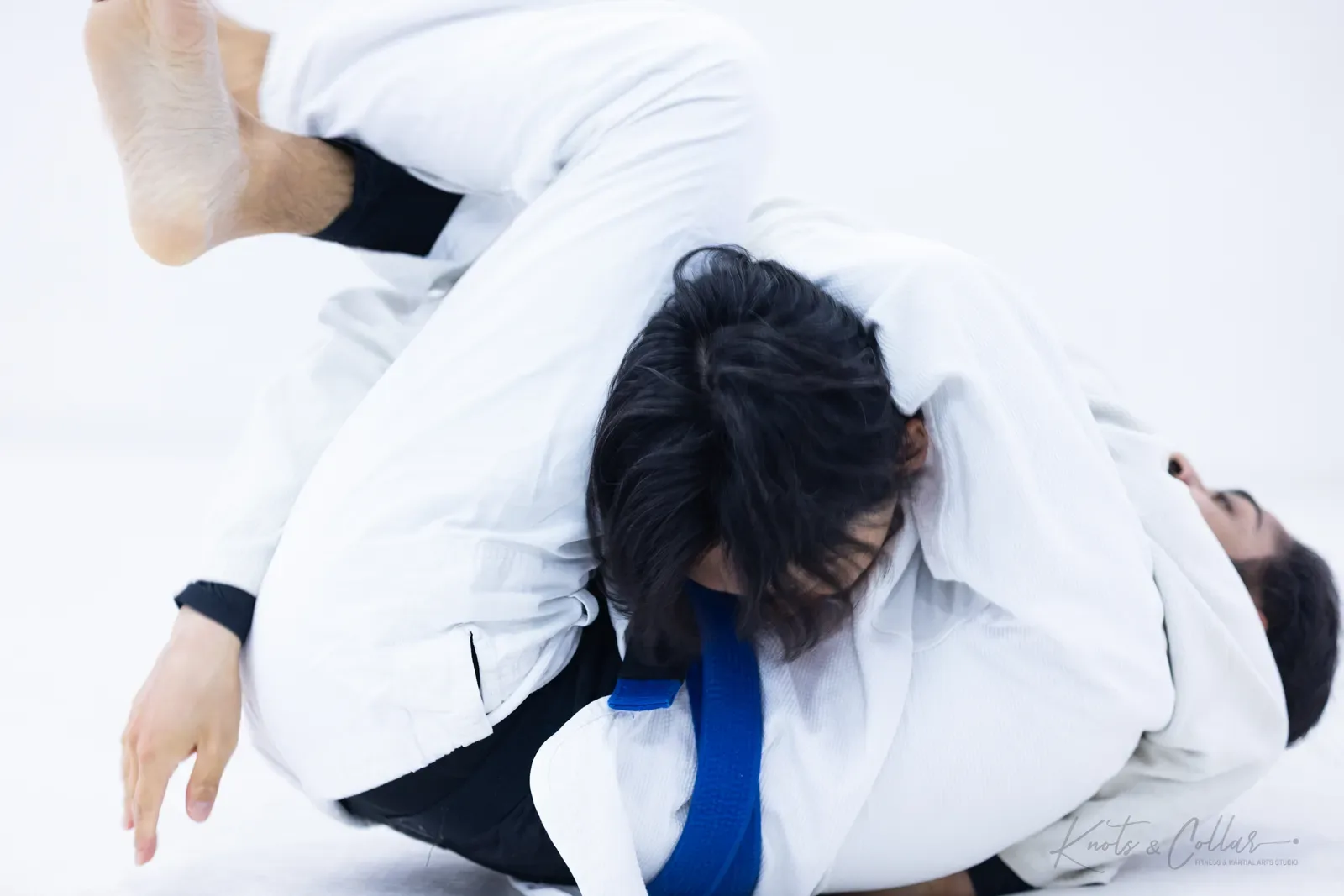 A gi Brazilian Jiu-Jitsu submission at Knots & Collar, Defence Colony, New Delhi, India