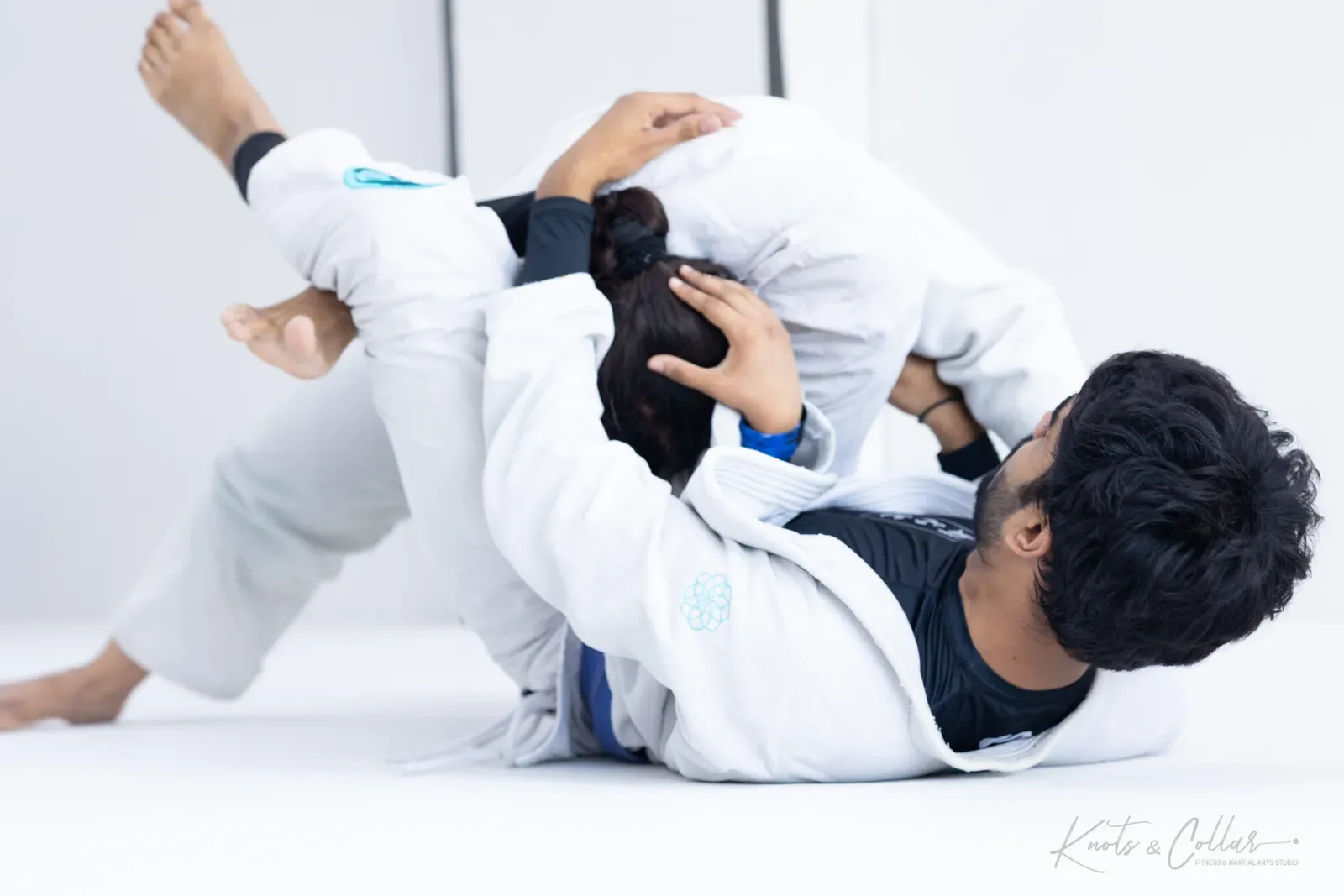 A gi Brazilian Jiu-Jitsu submission at Knots & Collar, Defence Colony, New Delhi, India