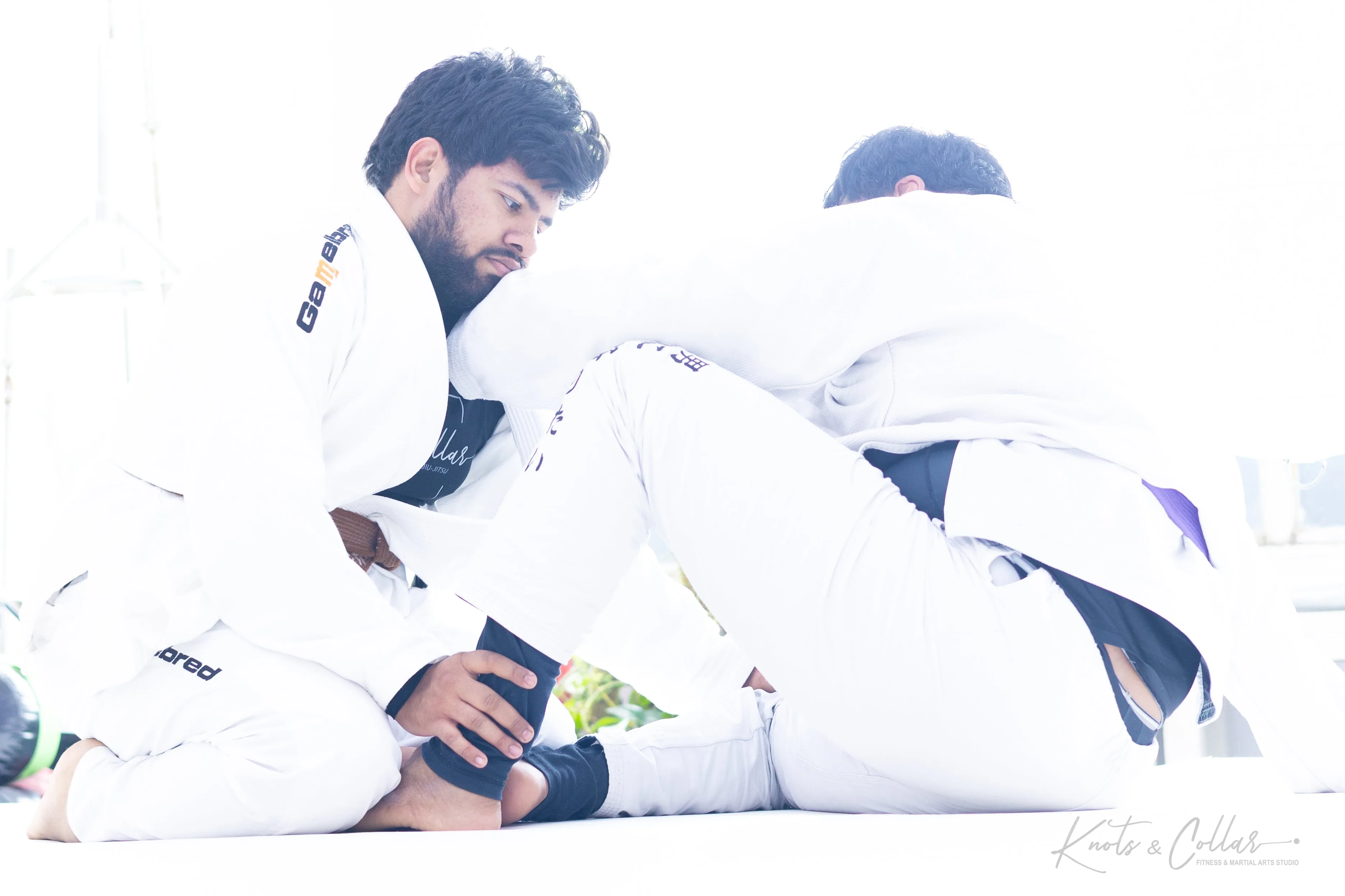 Gi BJJ ground control sparring at Knots and Collar Defence Colony New Delhi