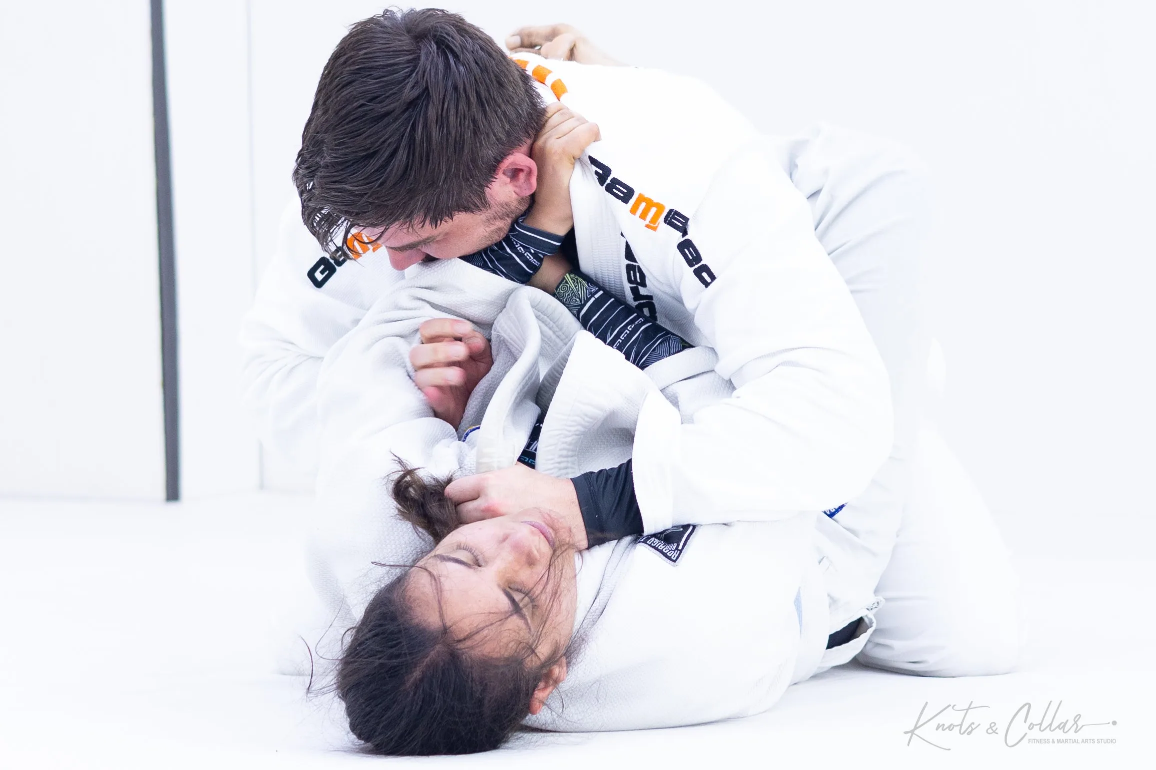 Gi BJJ sparring with collar grip at Knots and Collar Defence Colony New Delhi