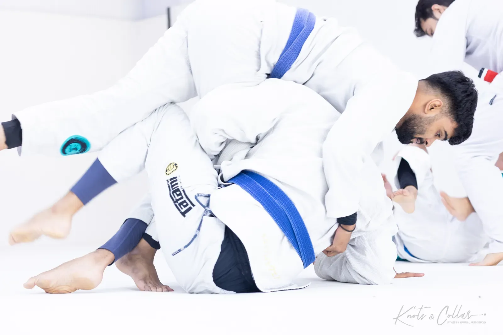 Blue belts scrambling during live rounds of Gi Brazilian Jiu-Jitsu at Knots & Collar, New Delhi