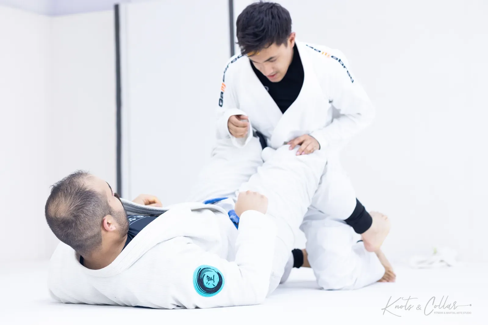 Passing the open guard in a Gi BJJ class at Knots & Collar, Defence Colony, New Delhi
