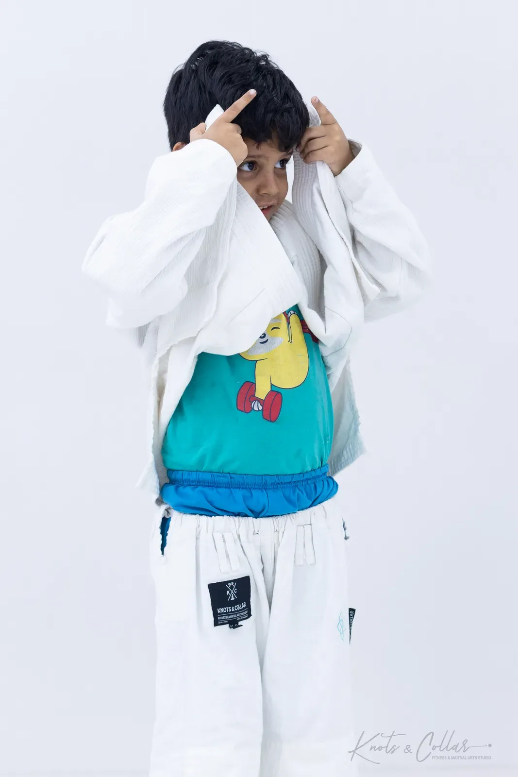 A young student on the mat at Knots & Collar, Defence Colony, New Delhi, India