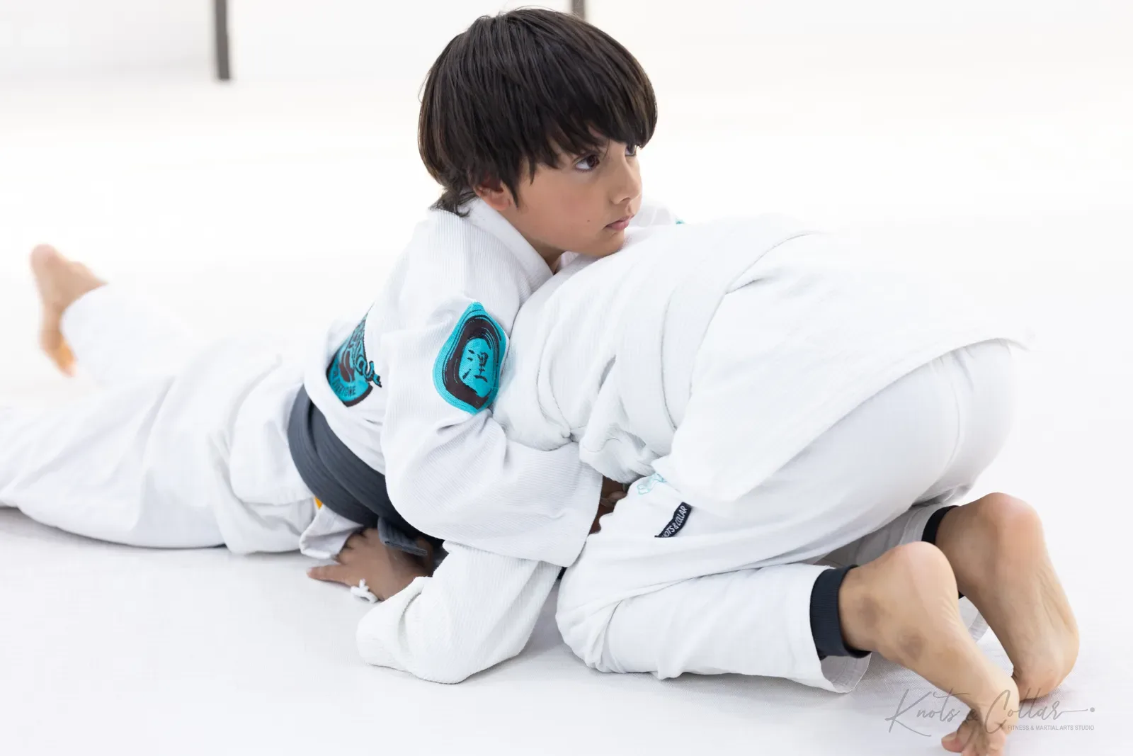 A young student on the mat at Knots & Collar, Defence Colony, New Delhi, India
