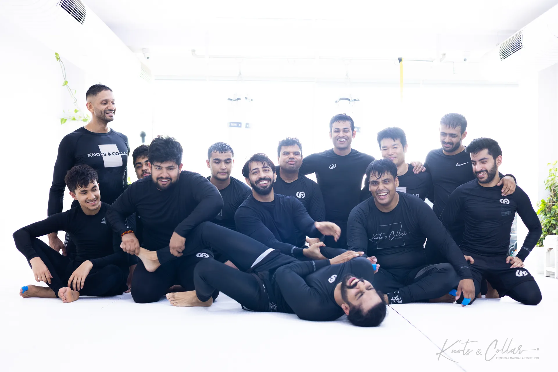 Two students training no-gi Brazilian Jiu-Jitsu from back control at Knots & Collar, Defence Colony, New Delhi