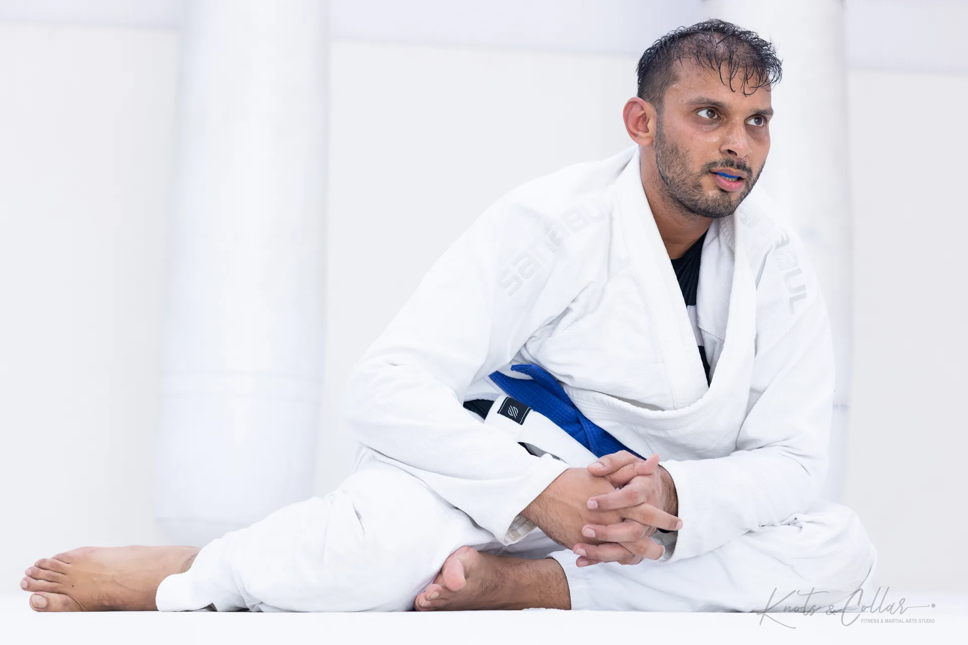 Two students training no-gi Brazilian Jiu-Jitsu from the back at Knots & Collar, Defence Colony, New Delhi