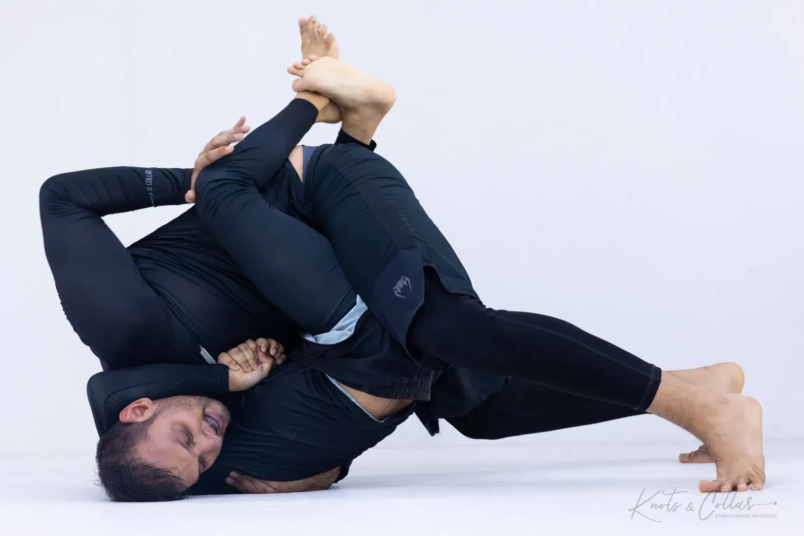 A no-gi Brazilian Jiu-Jitsu submission at Knots & Collar, Defence Colony, New Delhi, India