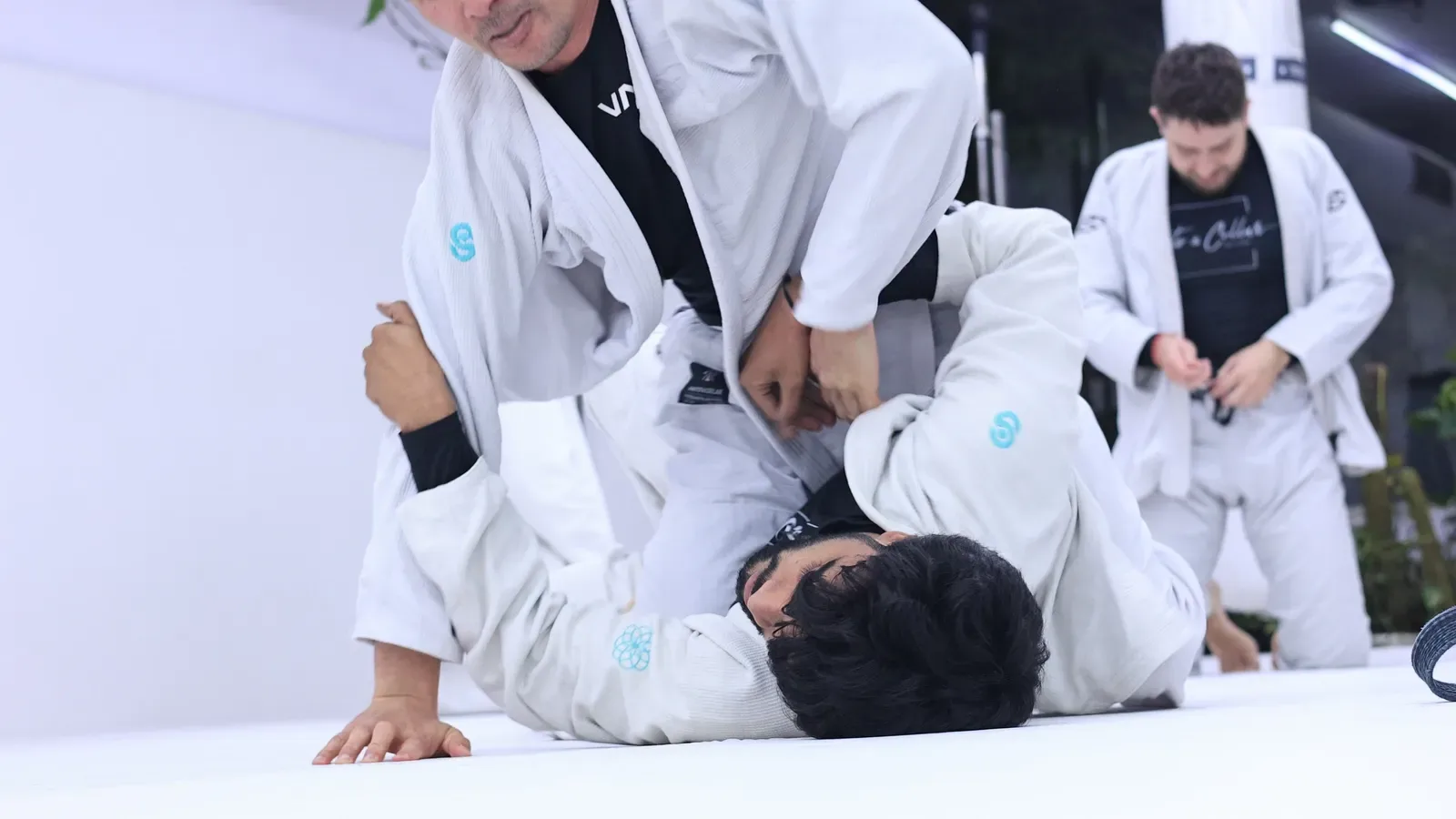 Professor Bek demonstrating from the top during the Checkmat Kazakhstan BJJ seminar at Knots & Collar, Delhi
