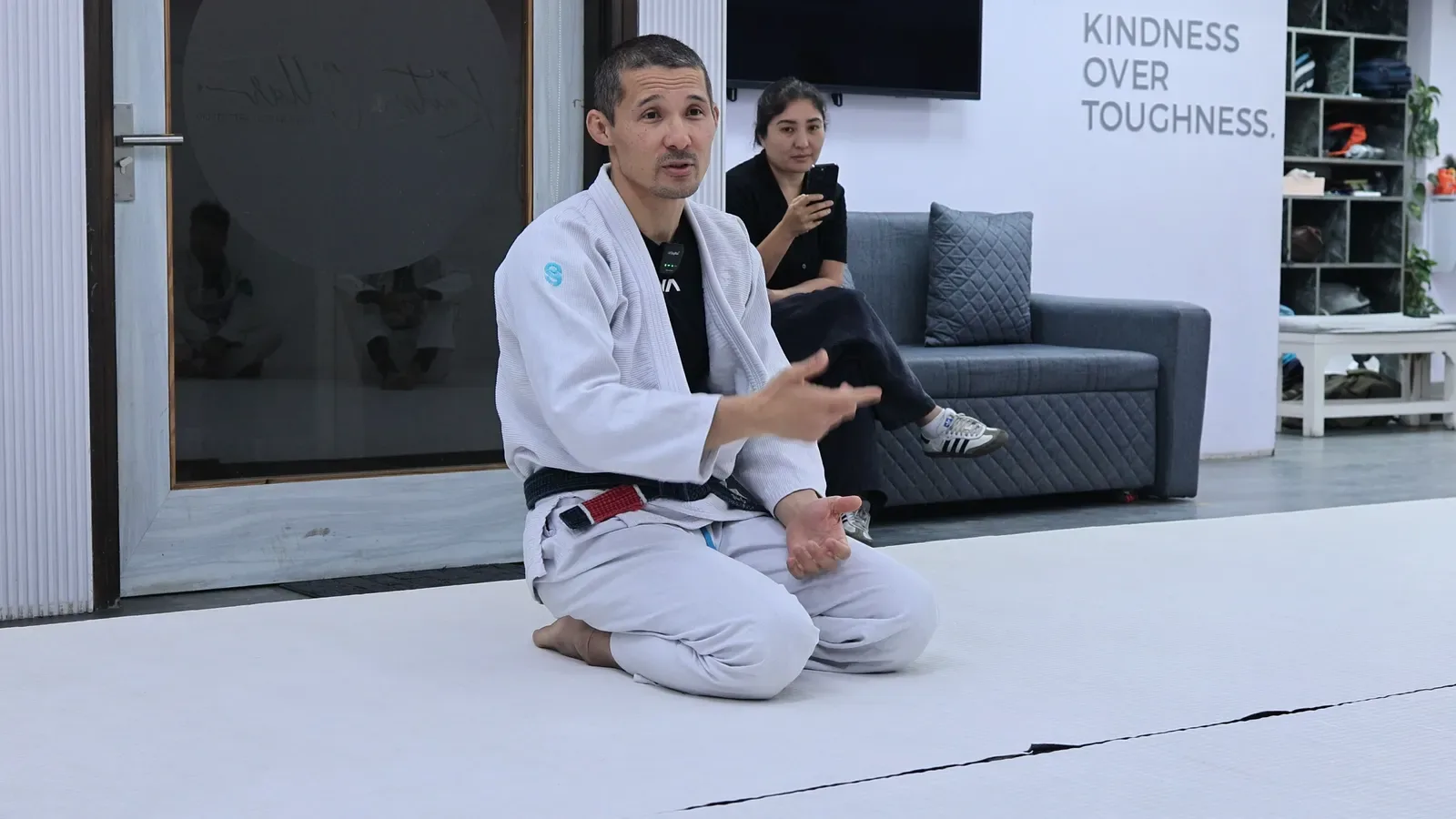 Professor Bek, founder of Checkmat Kazakhstan, speaking during his Brazilian Jiu-Jitsu seminar at Knots & Collar, New Delhi, India