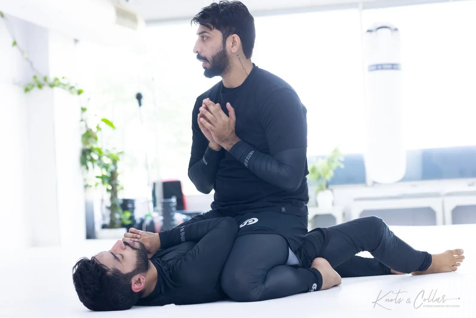 Professor Binish Sukhija — De La Riva black belt — on the mat at Knots & Collar, Defence Colony, New Delhi, India