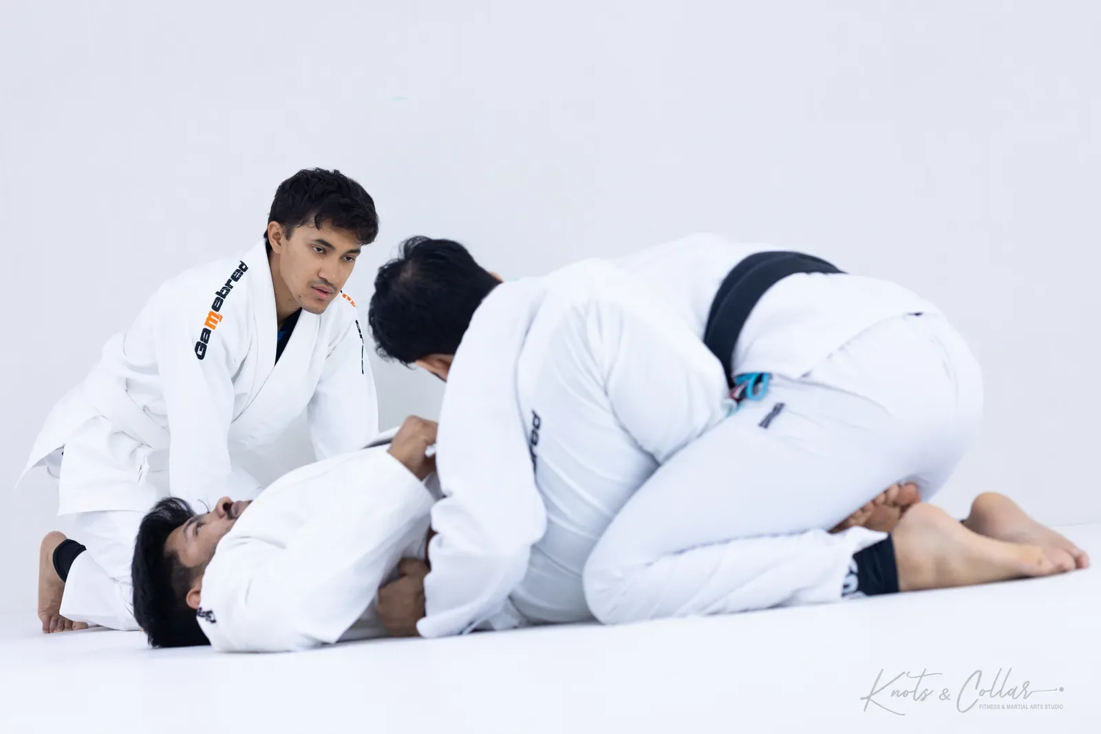 Professor Binish Sukhija — De La Riva black belt — on the mat at Knots & Collar, Defence Colony, New Delhi, India