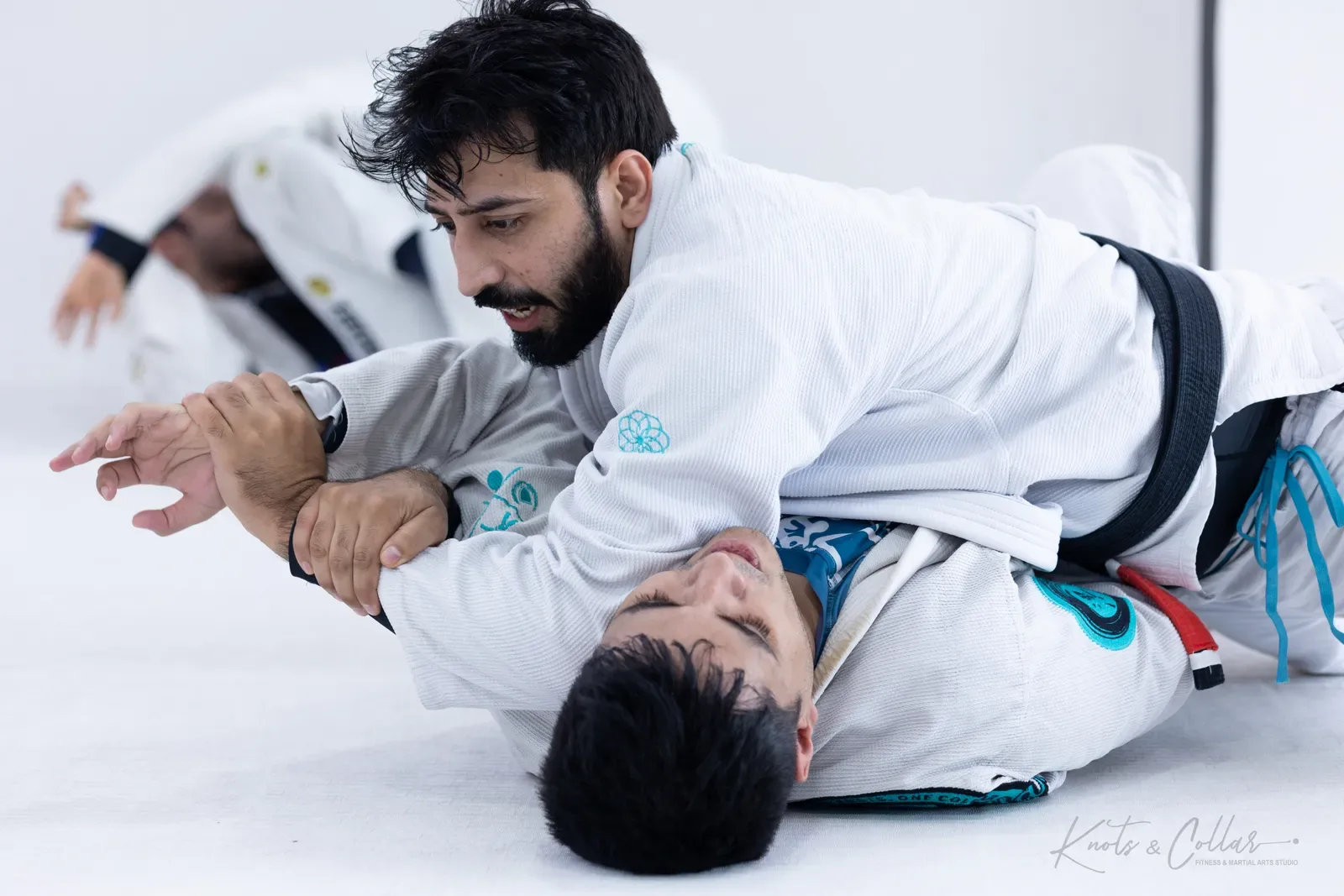Professor Binish Sukhija, Brazilian Jiu-Jitsu black belt in India, coaching a class at Knots & Collar, Defence Colony, New Delhi