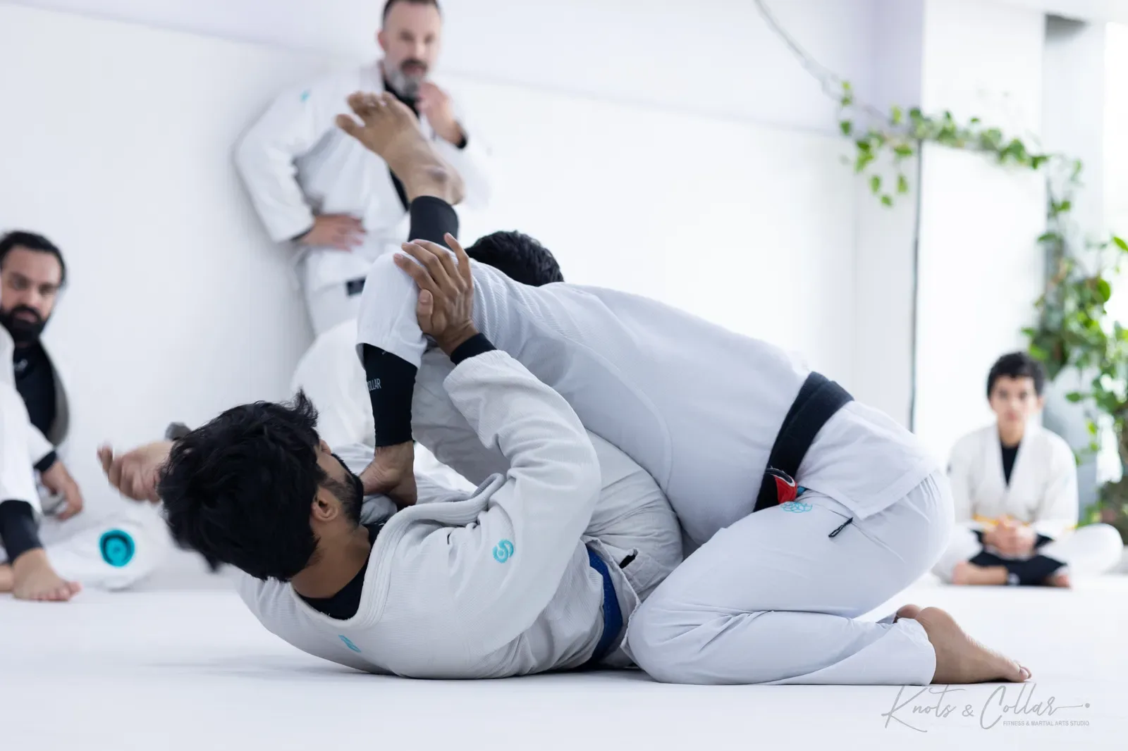 Professor Binish Sukhija — De La Riva black belt — on the mat at Knots & Collar, Defence Colony, New Delhi, India
