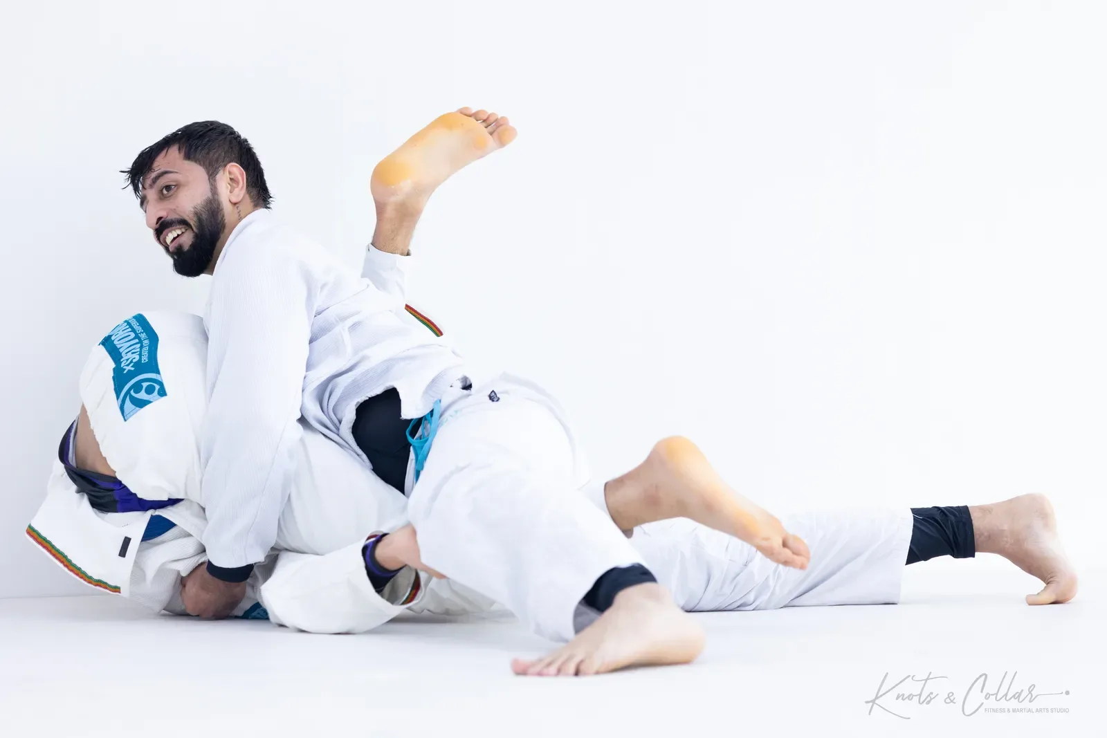 Professor Binish Sukhija — De La Riva black belt — on the mat at Knots & Collar, Defence Colony, New Delhi, India