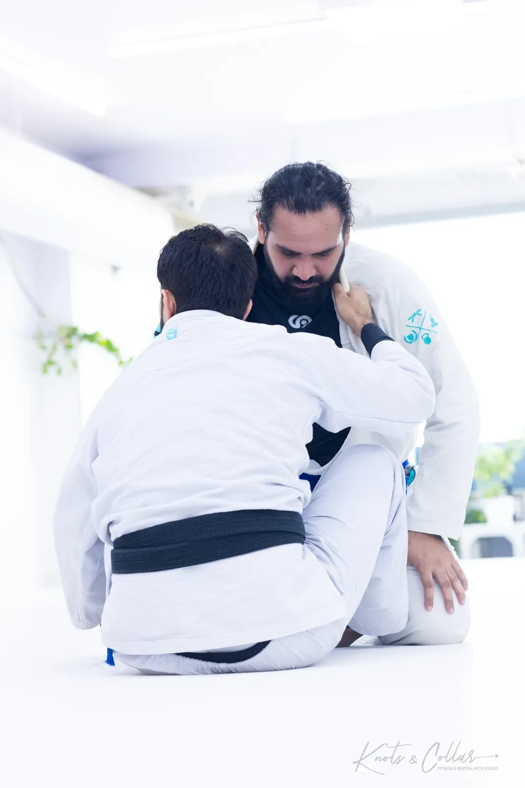 Professor Binish Sukhija — De La Riva black belt — on the mat at Knots & Collar, Defence Colony, New Delhi, India