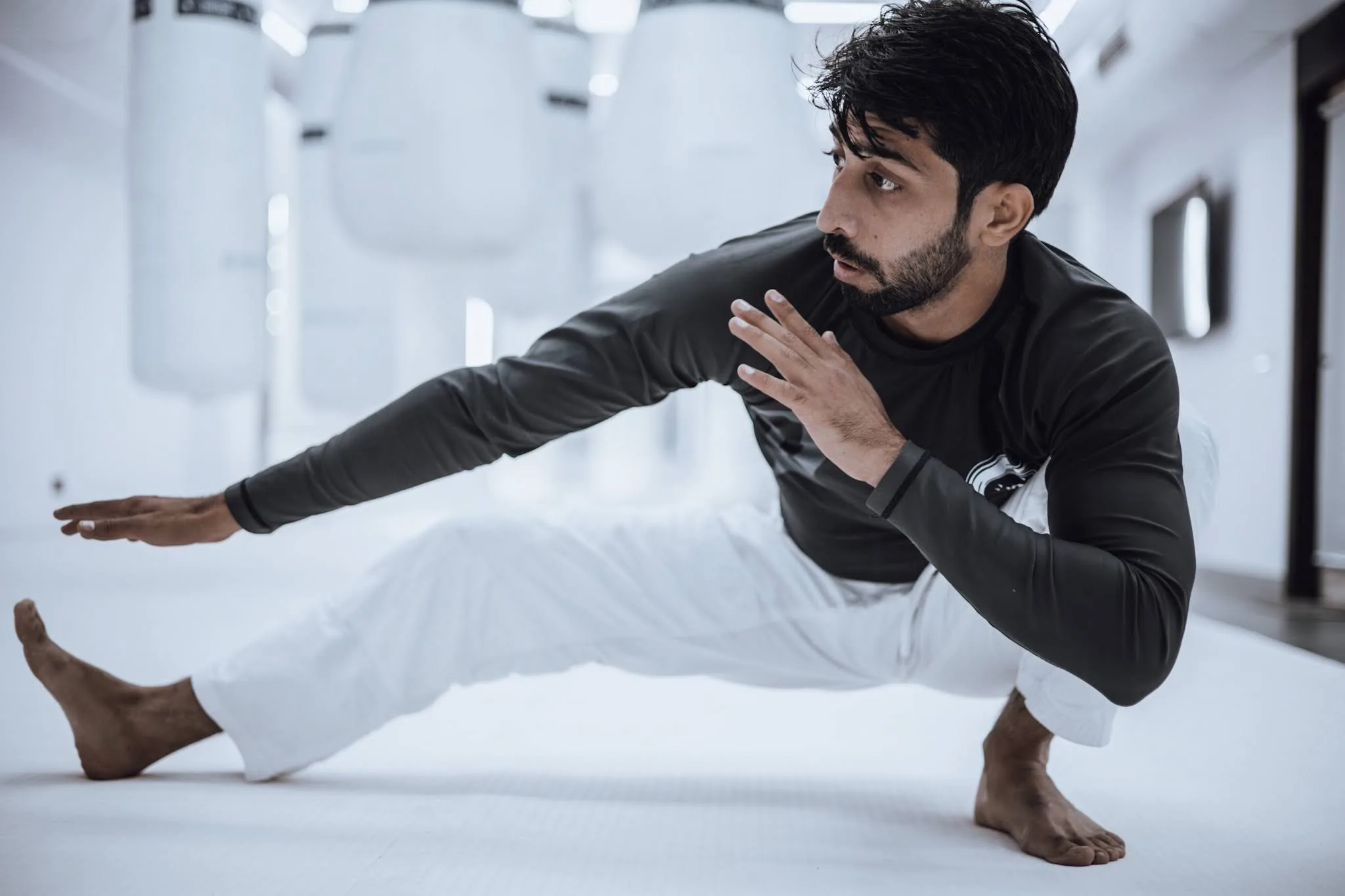 Professor Binish Sukhija BJJ black belt De La Riva lineage founder Knots and Collar Defence Colony New Delhi