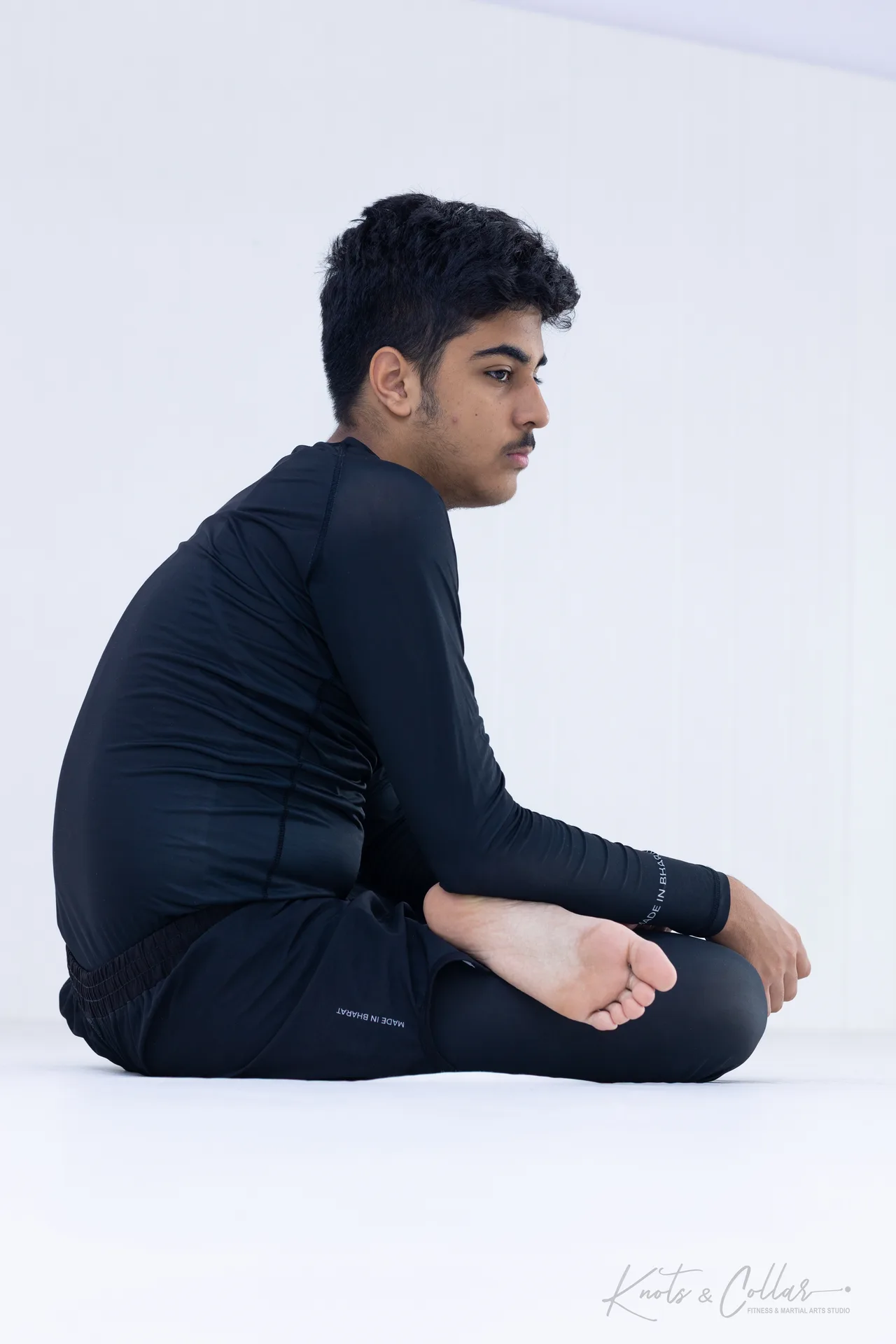 A teenage student in a Made-in-Bharat Knots & Collar rashguard at the Brazilian Jiu-Jitsu studio in Defence Colony, New Delhi