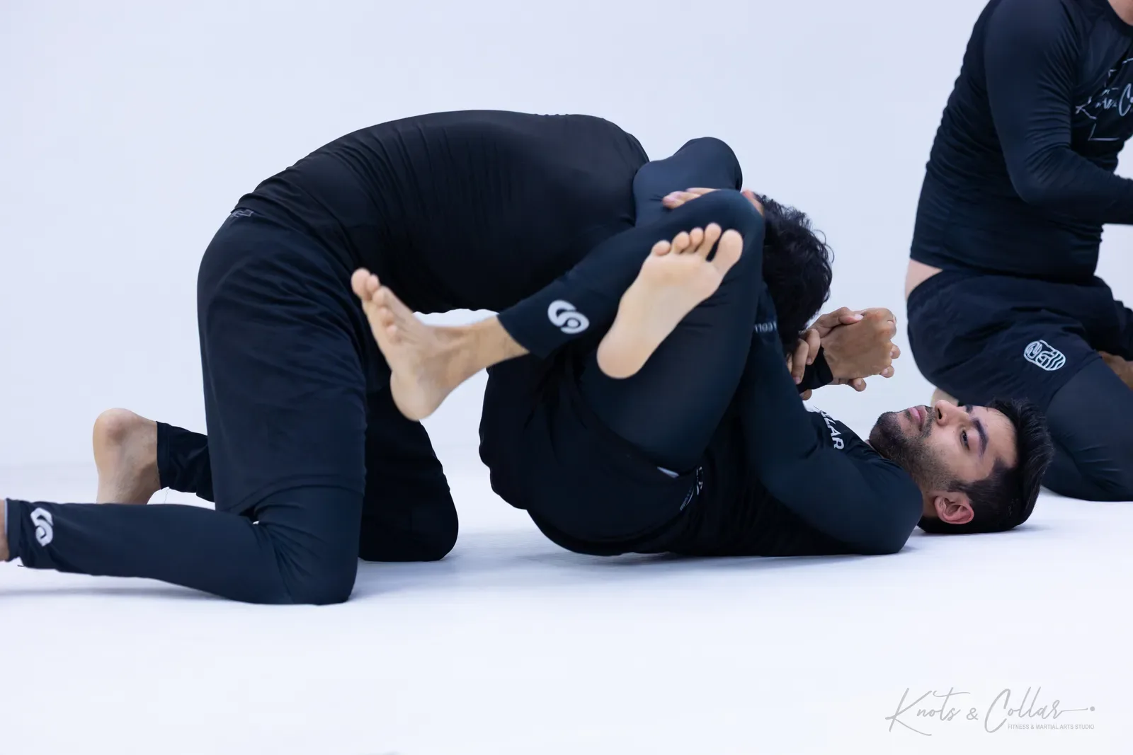 No-Gi Brazilian Jiu-Jitsu rolling at Knots & Collar in Delhi, open to visiting grapplers who drop in while travelling