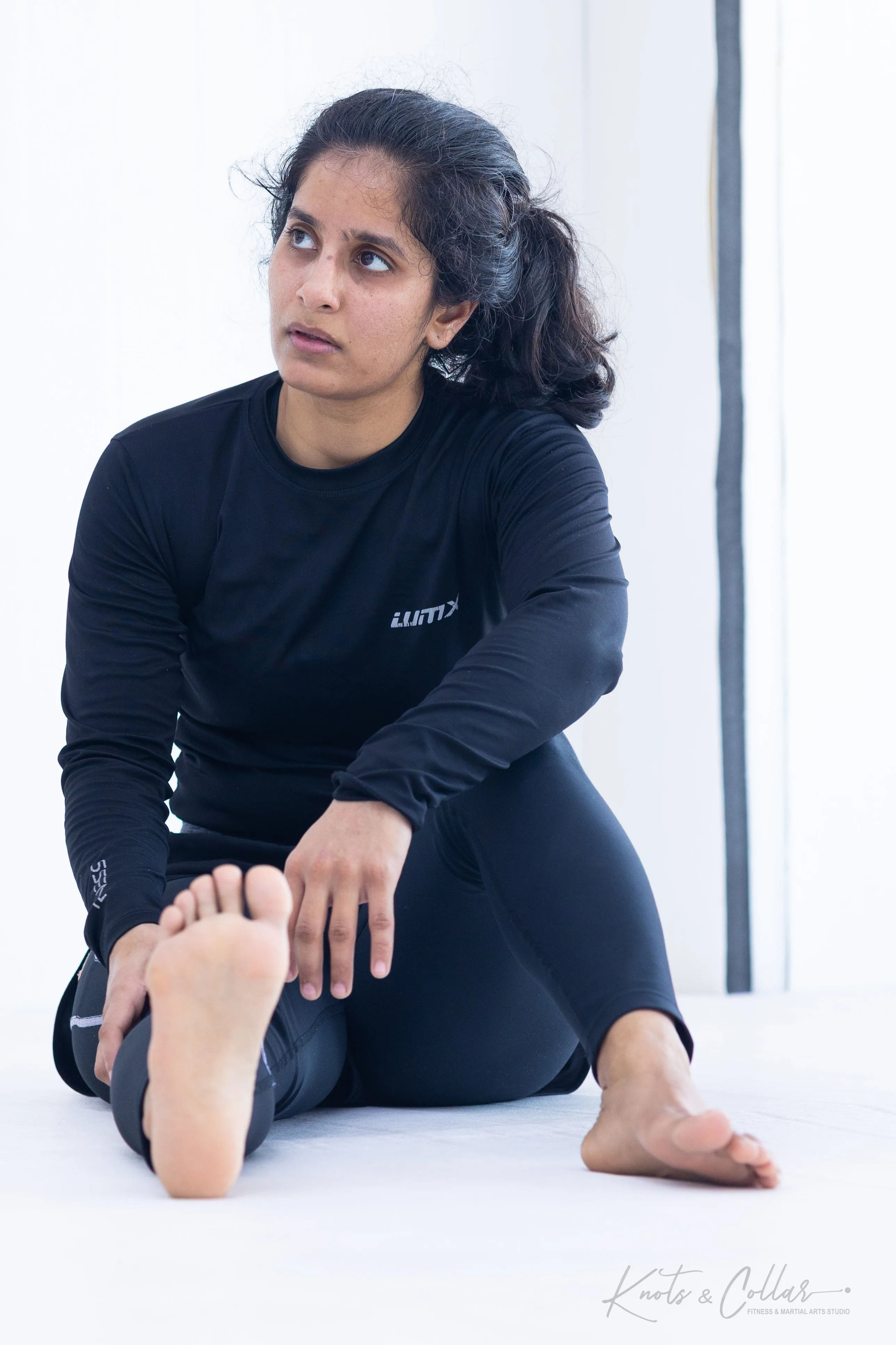 Woman training No-Gi BJJ at Knots and Collar Defence Colony New Delhi