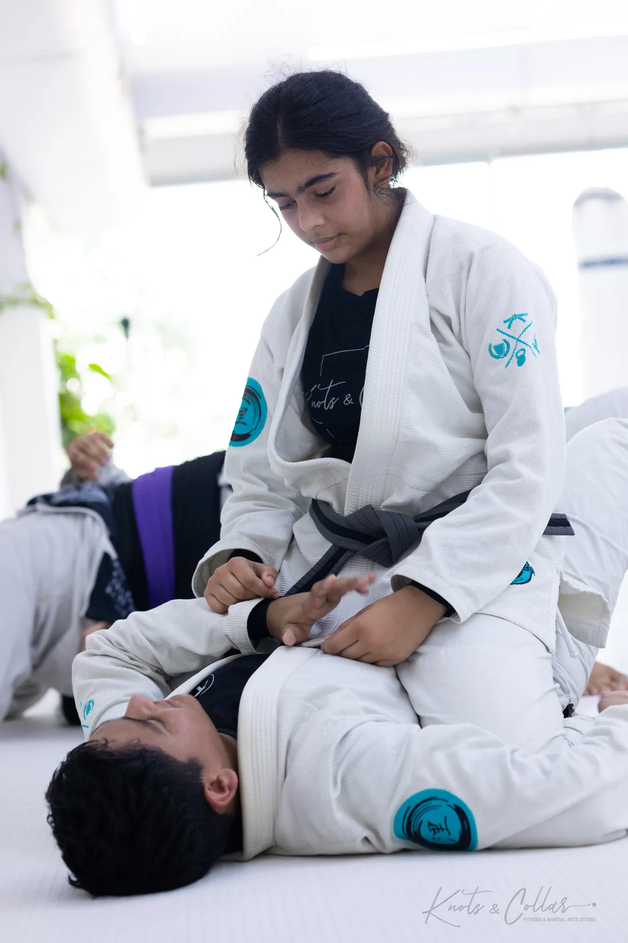 A woman training Brazilian Jiu-Jitsu at Knots & Collar, Defence Colony, New Delhi